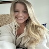 Selfie of a person smiling indoors